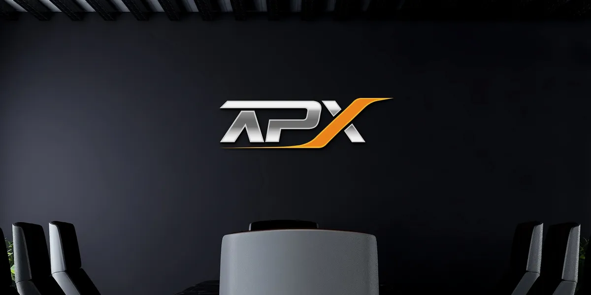 APX logo mounted on the wall of the APX conference room.